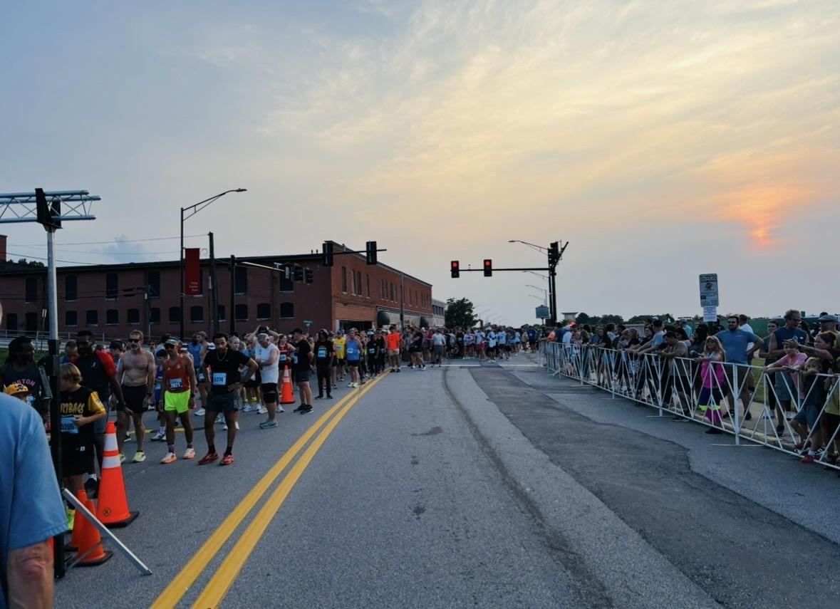 Runners lined up at sunset for a Brick-timed race in Danville